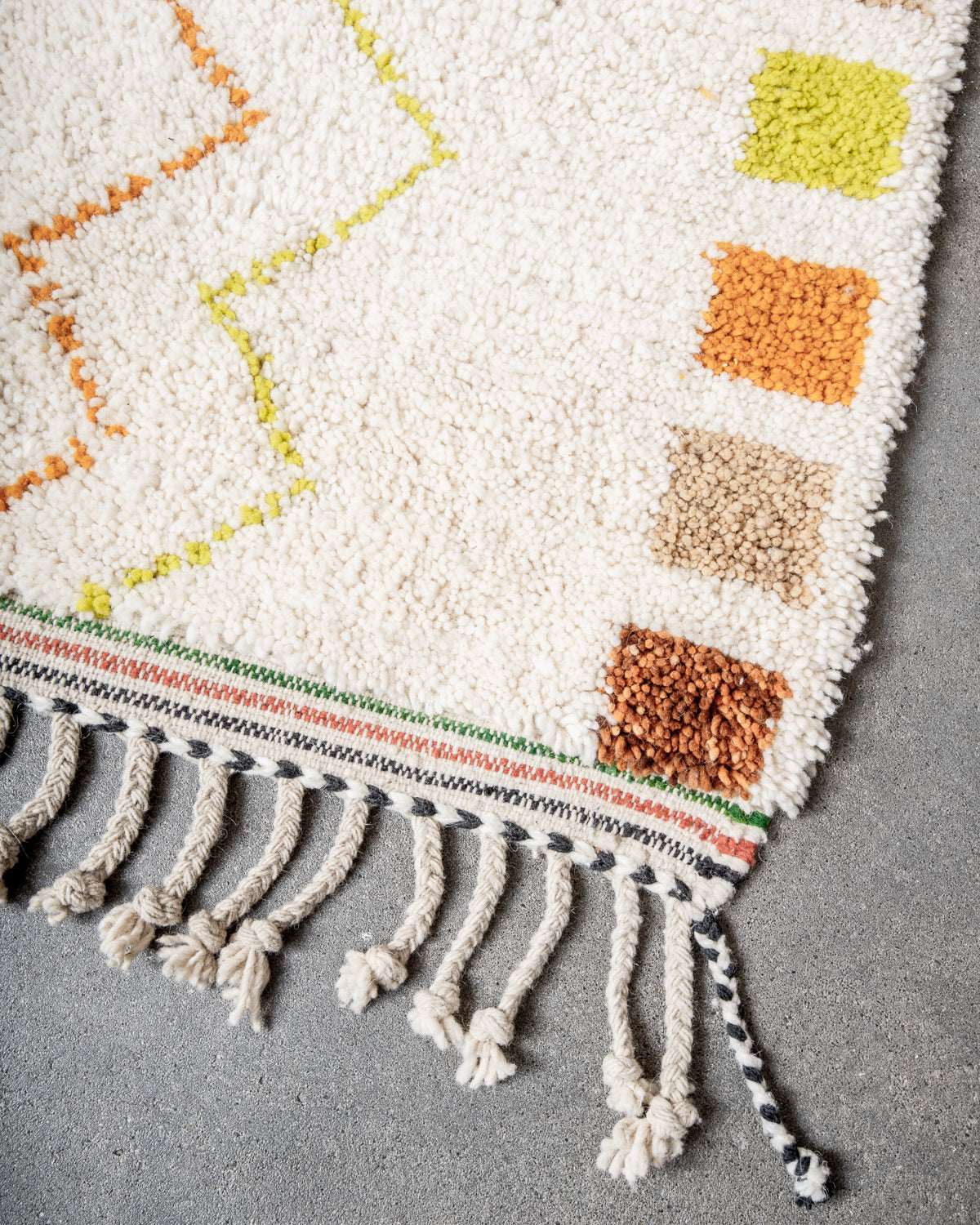 Modern, designer, handcrafted Berber rug from Morocco. Beniourain carpet with beautiful colours and patterns and fluffy wool texture.